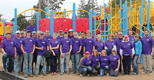 Volunteers Installing a Playground